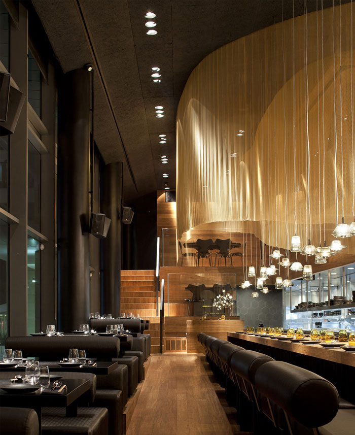 Restaurant Interior Decorating in Golden Color Scheme - InteriorZine
