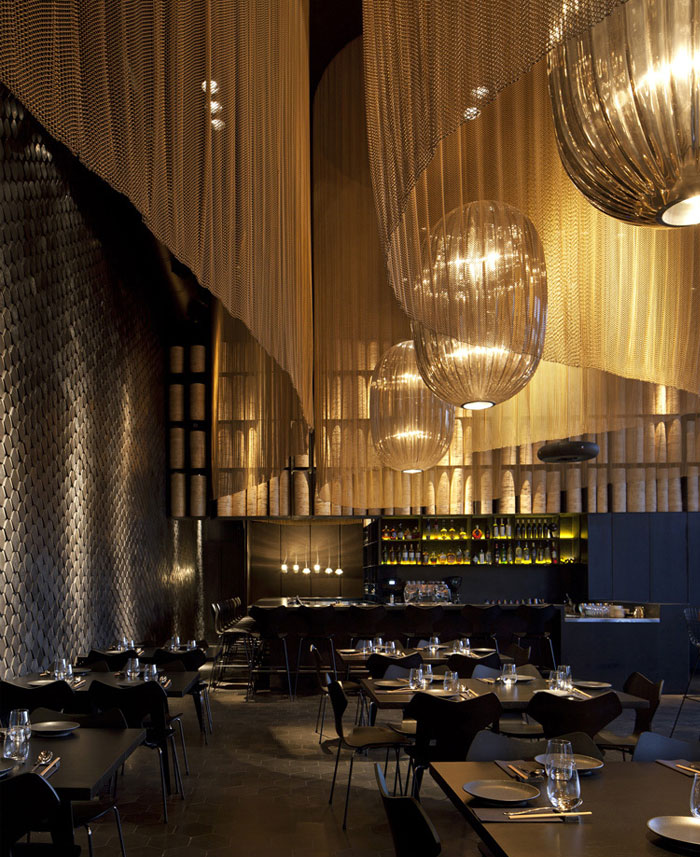 Restaurant Interior Decorating in Golden Color Scheme - InteriorZine