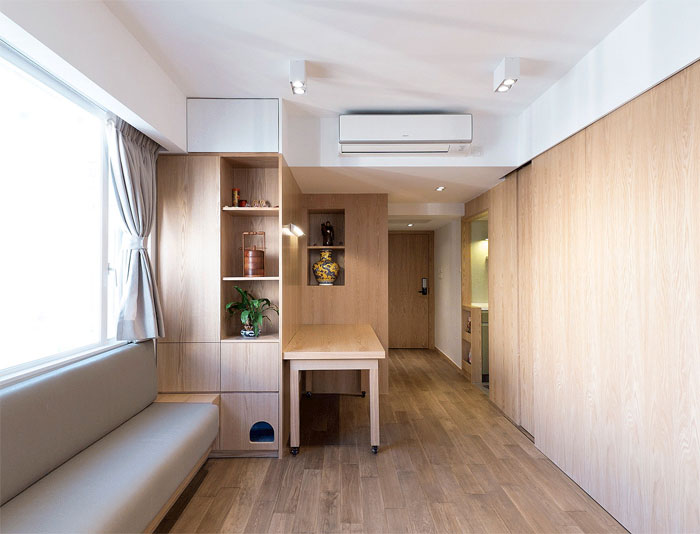 Overcoming A Dark Apartment With Ingenious Lighting Schemes