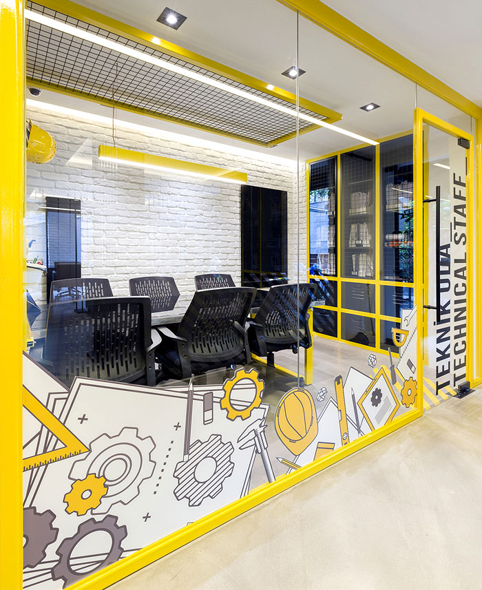 Black and Yellow Emre Group Office Interior - InteriorZine