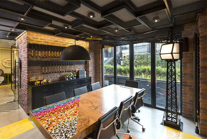 Black and Yellow Emre Group Office Interior - InteriorZine