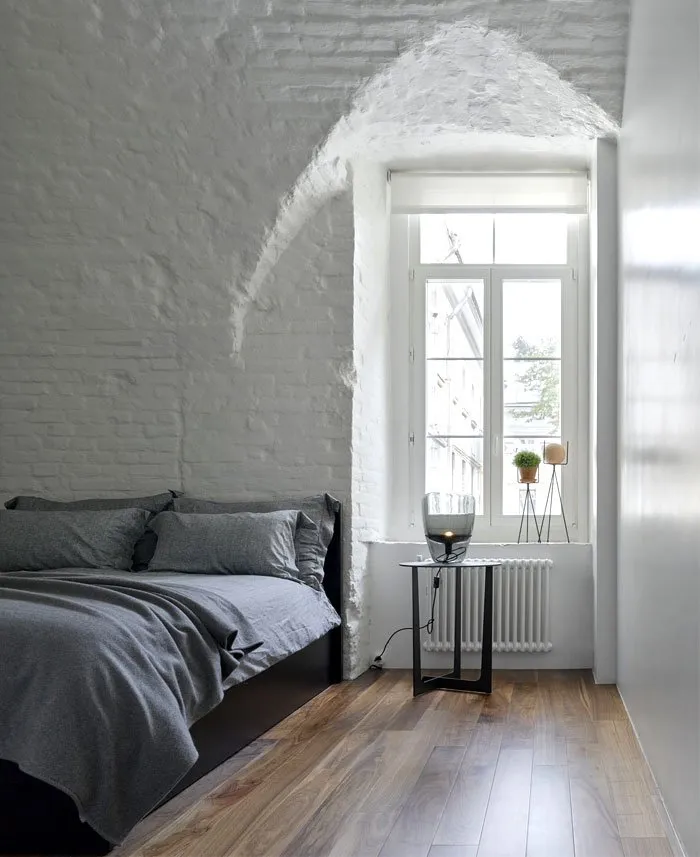 Cozy Apartment With Exposed Brick Walls and Arches - InteriorZine